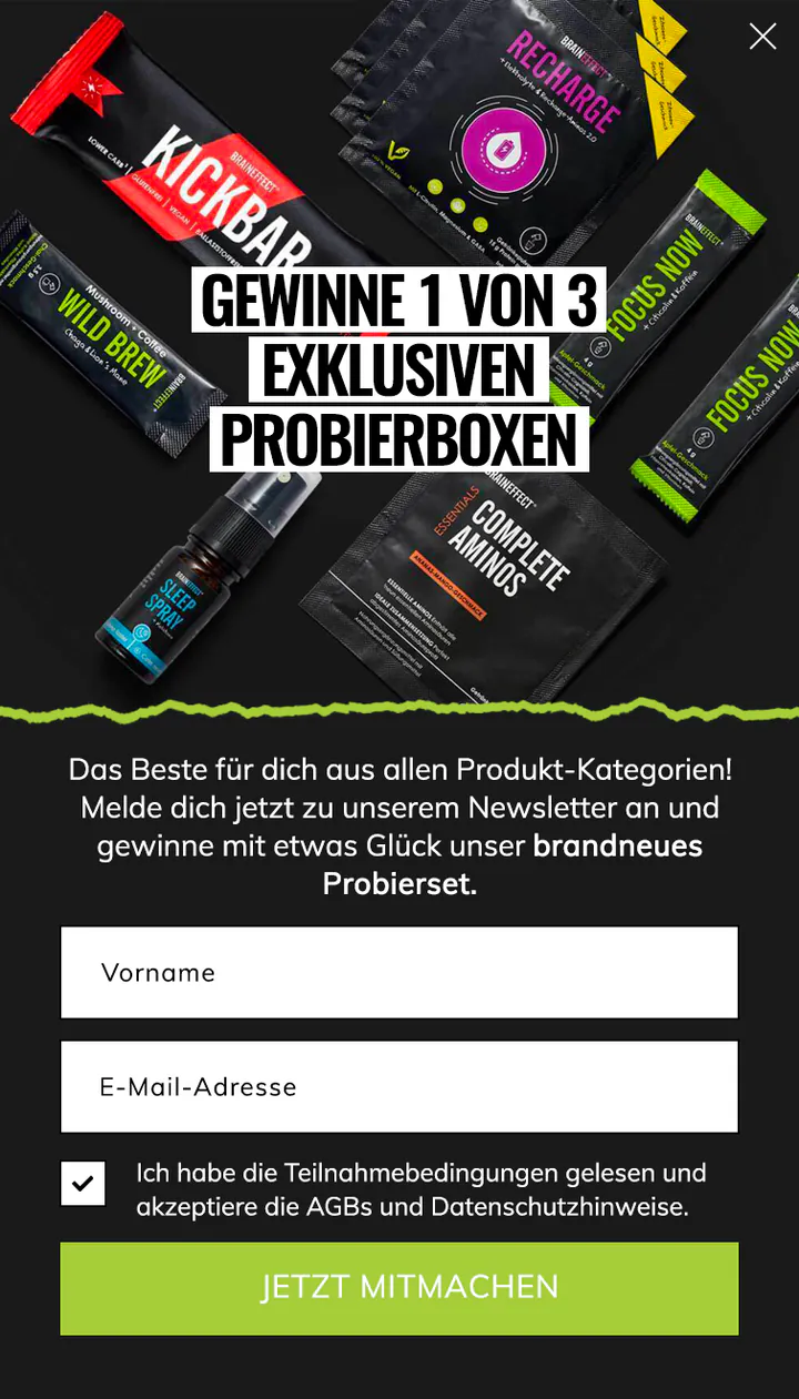 BrainEffect mobile pop-up in German: energy bars, sachets and a sleep spray scattered on black under the headline “Gewinne 1 von 3 exklusiven Probierboxen”, above name and email fields and a lime button.