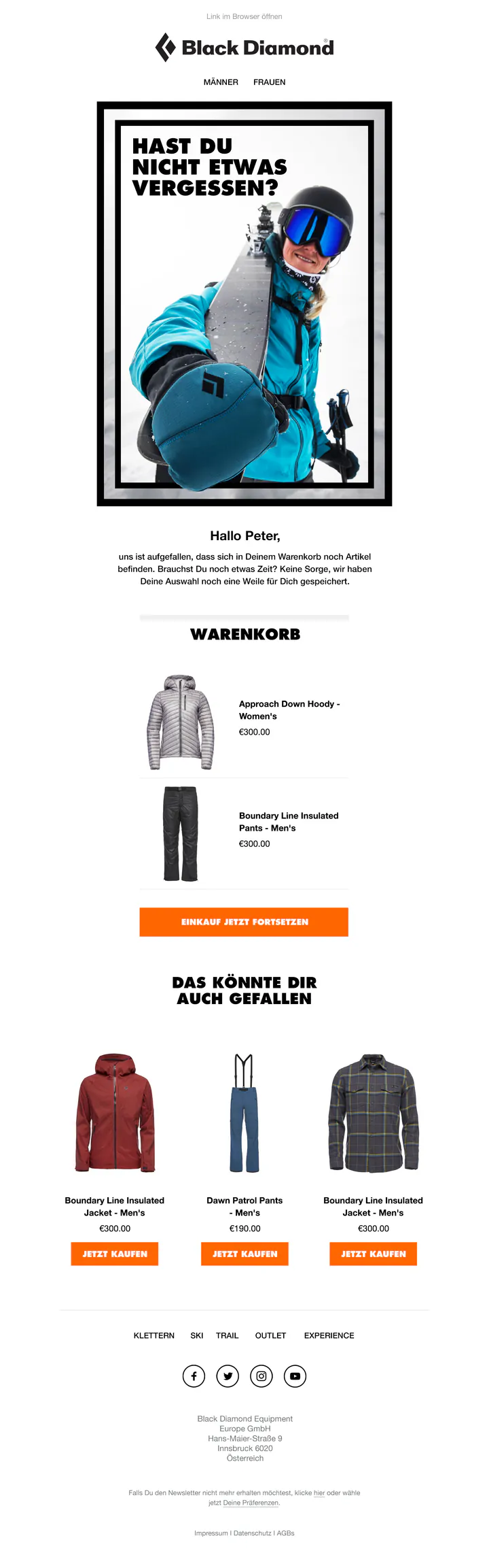 Black Diamond abandoned-cart email in German. Inside a heavy black frame, a smiling skier in a turquoise jacket holds a ski towards the camera under the headline “Hast du nicht etwas vergessen?”. Below are a short note to the customer, the basket with a down hoody and insulated trousers at €300 each, an orange button to continue shopping, and three recommended products, each with an orange buy button.