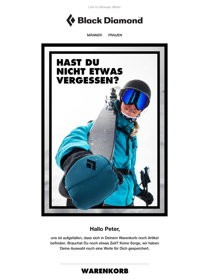 Black Diamond abandoned-cart email in German: inside a heavy black frame, a smiling skier in a turquoise jacket holds a ski towards the camera under the headline “Hast du nicht etwas vergessen?”.